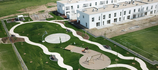 Mi történik, ha egy lakópark végre nem elszigetelődik, hanem illeszkedik a városi szövetbe?