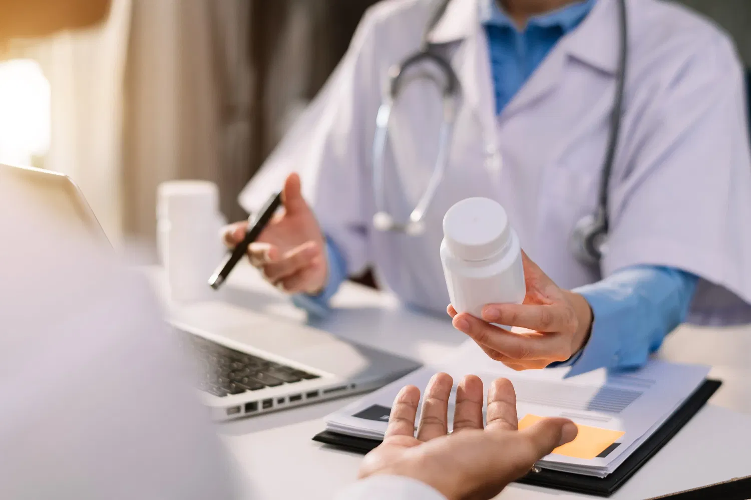 Doctor explaining medication details to patient, development of patient brochures by WaveMed agency