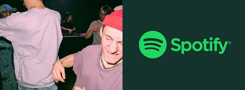 Spotify-logo og to mænd, der danser