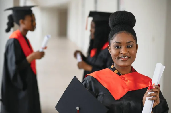 Multiracial Graduates with Diploma.webp