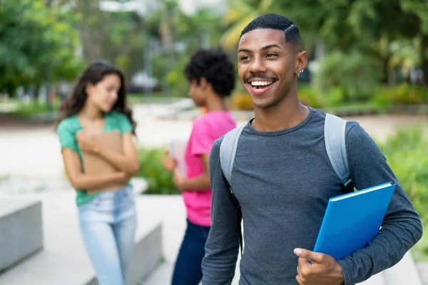 African American student laughing.webp