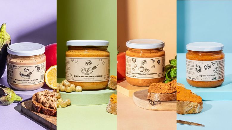 From left to right, the following KoRo products can be seen: organic eggplant spread, organic chickpea spread, organic tomato and basil spread, and spicy organic paprika spread.