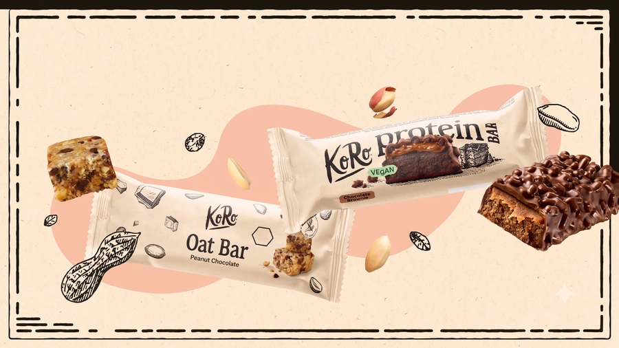 Der KoRo Bio Oat Bar Peanut Chocolate und der vegane KoRo Protein Bar Chocolate Brownie schwebend dargestellt im typischen KoRo-Design mit herumlaufendem Rahmen.
