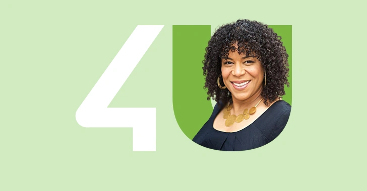 Portrait of our Chief People Officer against a solid green background, featuring the U4 company logo.