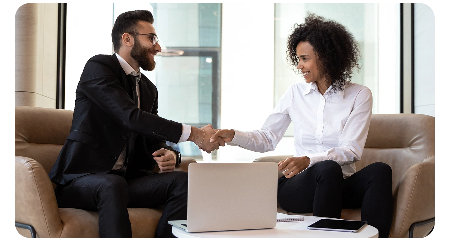 Man and woman shaking hands