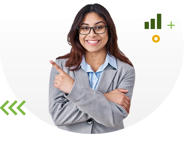 Smiling woman with glasses pointing to the left