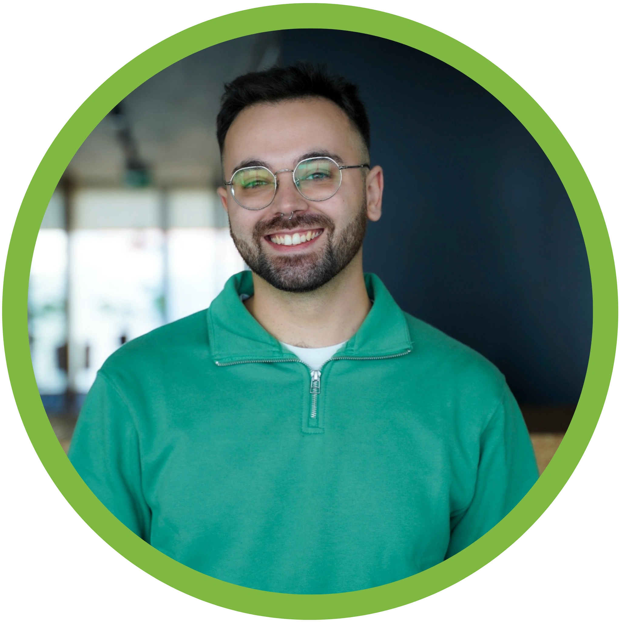 Employee Tomás smiling to the camera