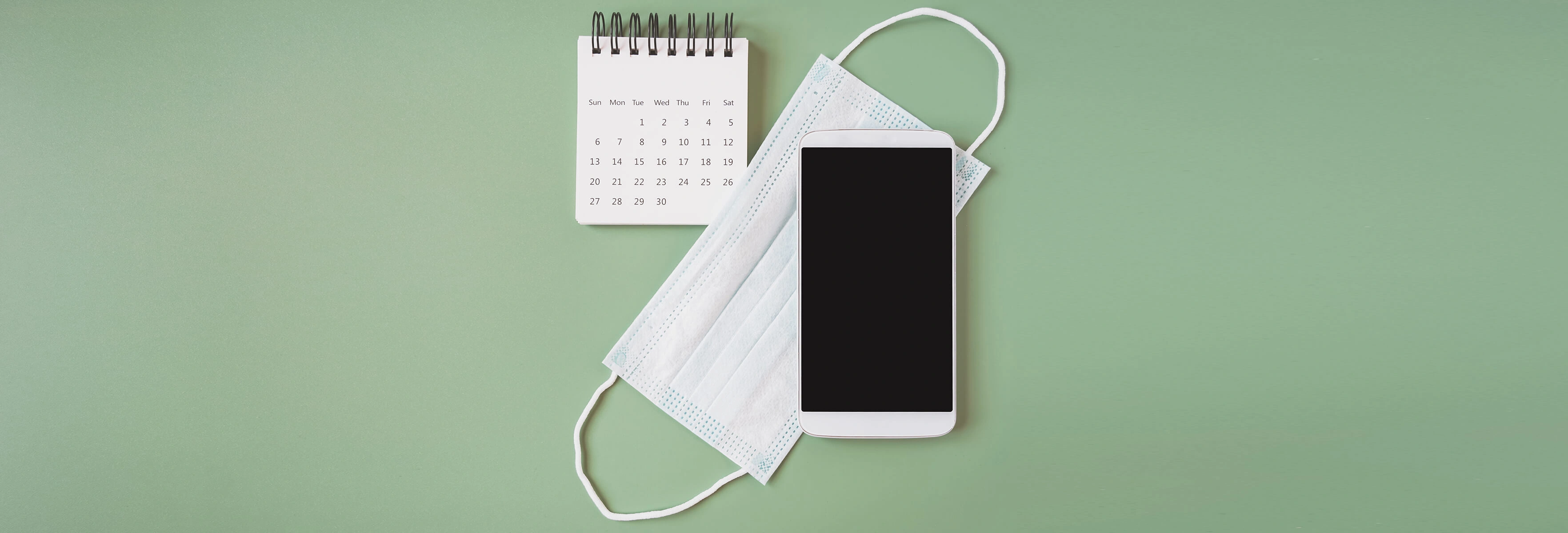 mask with phone and calendar