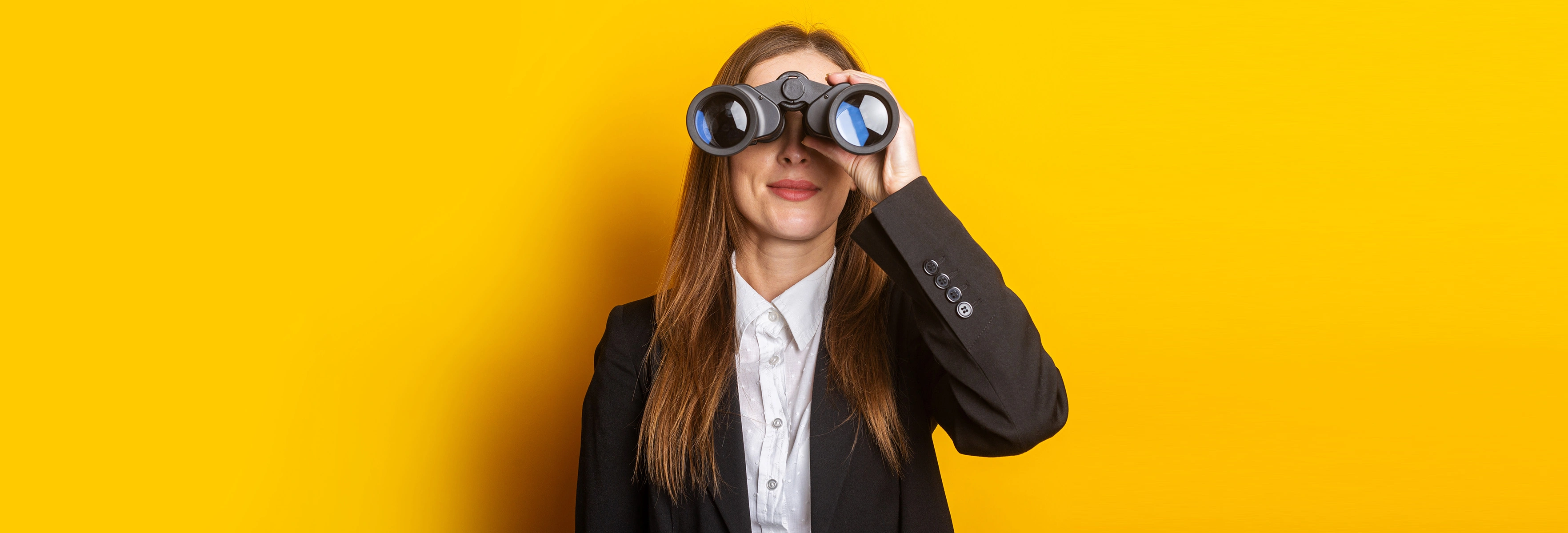 person with binoculars