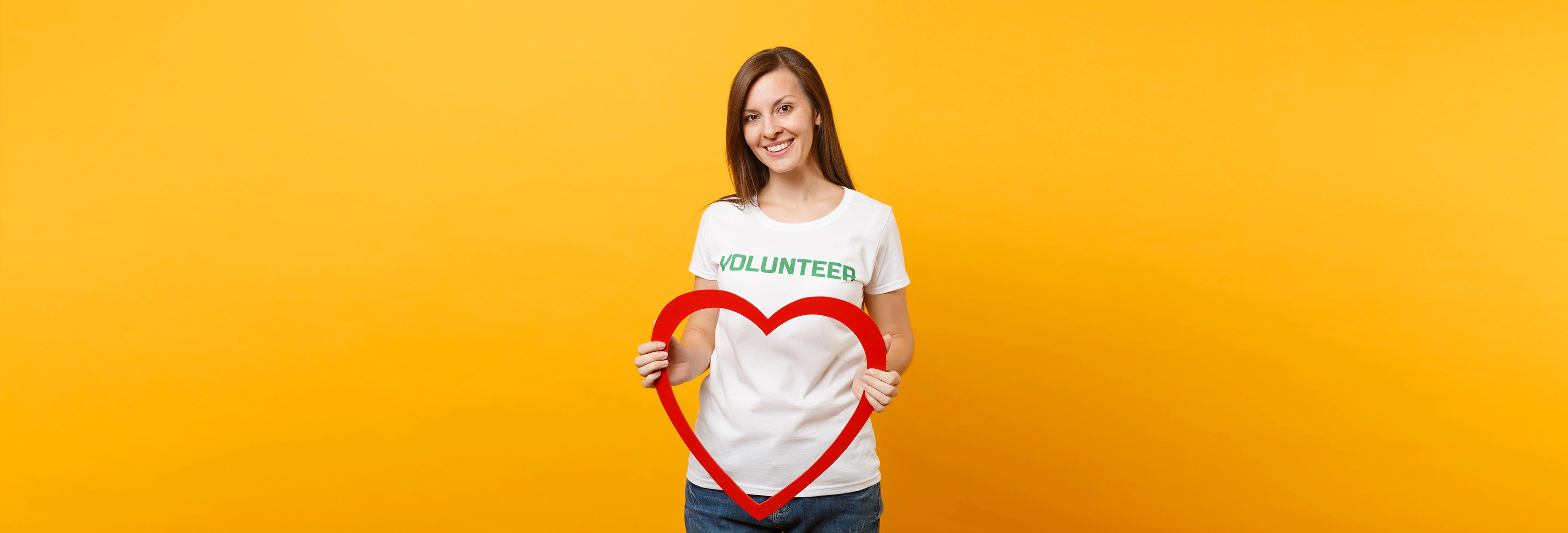 woman with volunteer tshirt and red heart