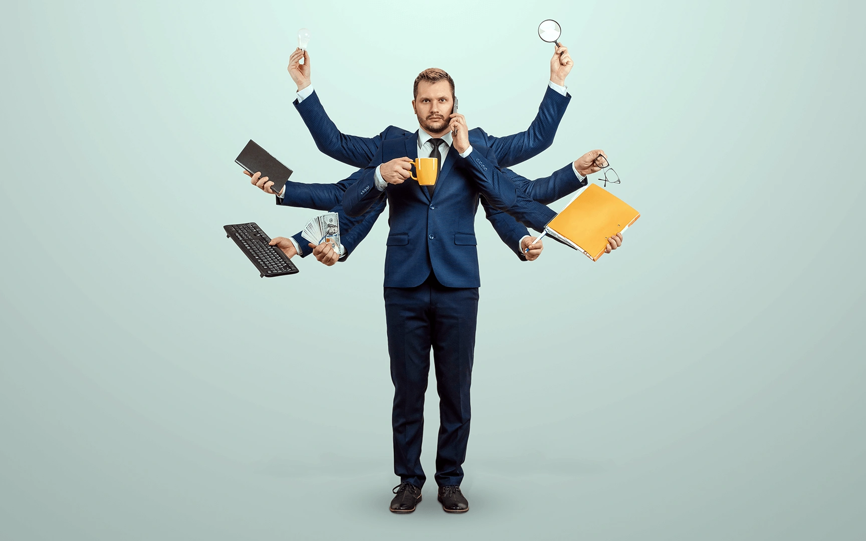 man in suit with 10 arms, holding mug, phone, money, lightbulb, magnifying glass, keyboard, notebook, glasses pen, folder