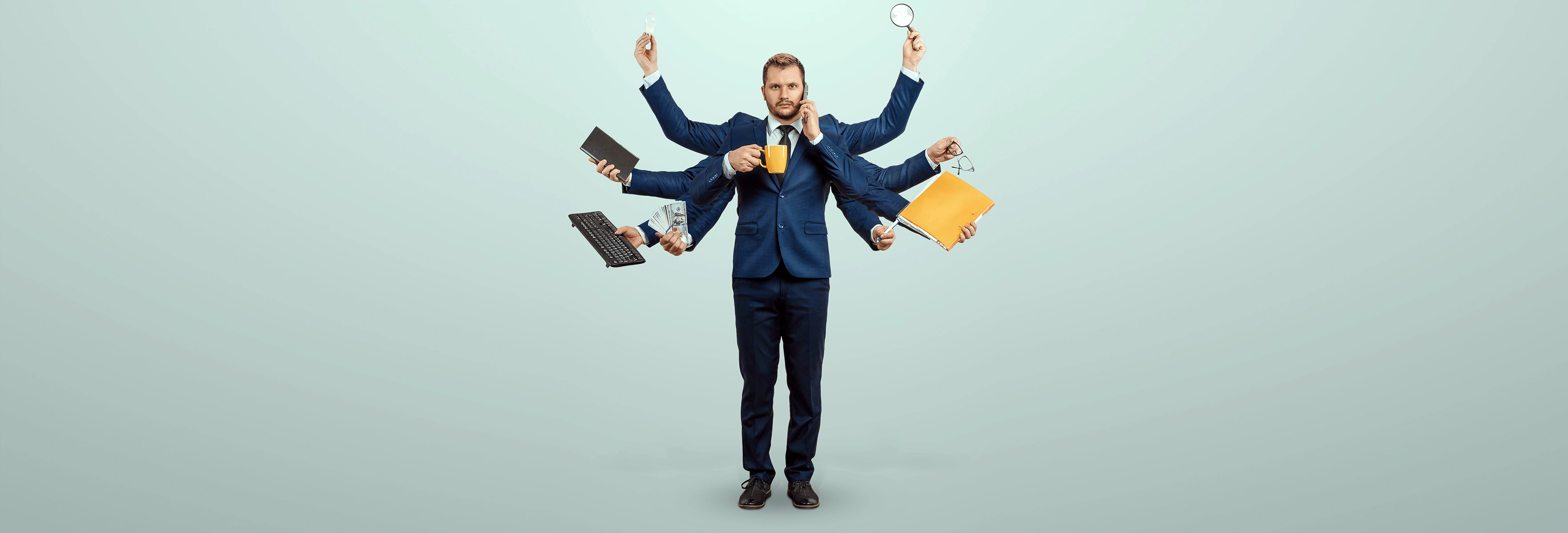man in suit with 10 arms, holding mug, phone, money, lightbulb, magnifying glass, keyboard, notebook, glasses pen, folder