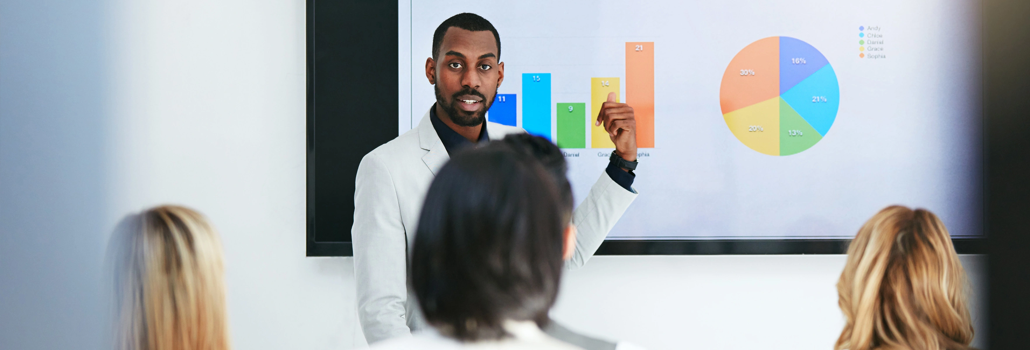 business people looking at presentation