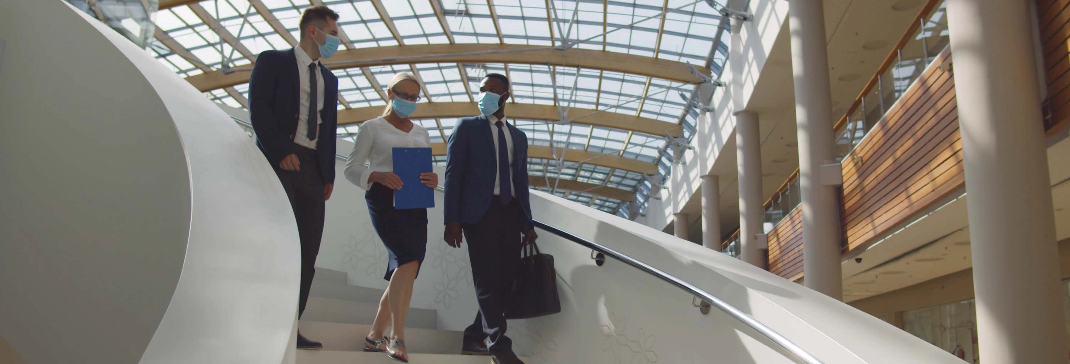 people walking on stairs, face masks