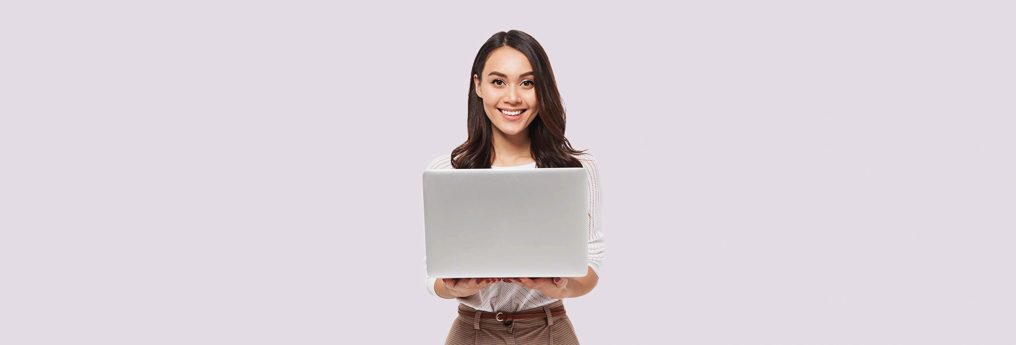 person smiling with laptop