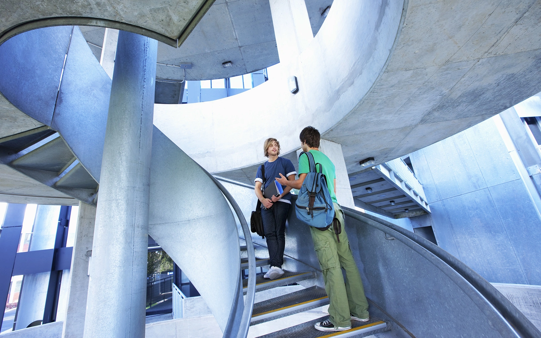 People talking on staircase 