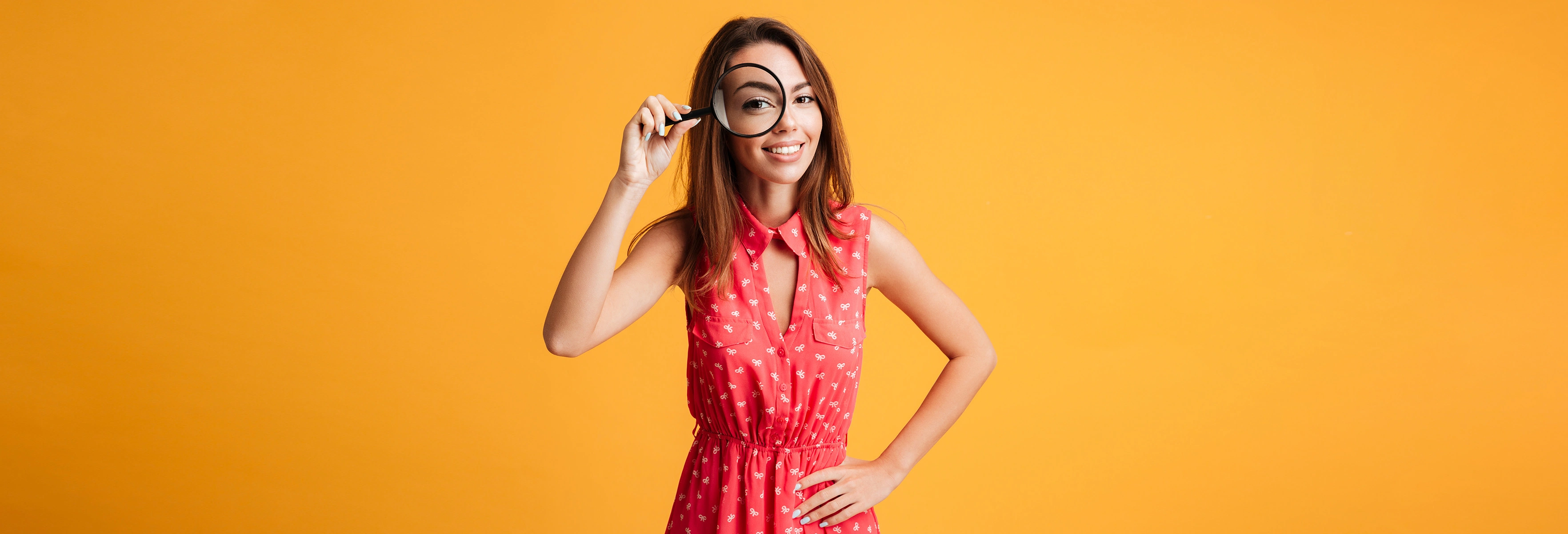happy woman with magnifying glass