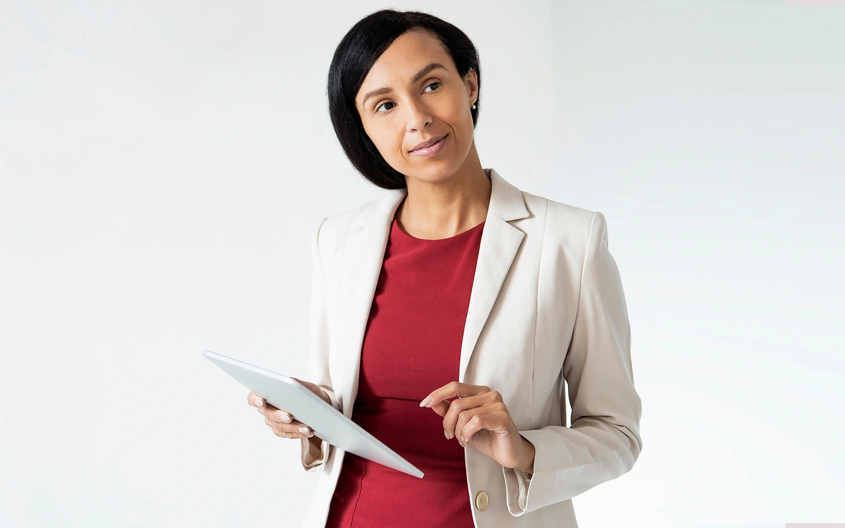 Smart dressed woman holding a tablet