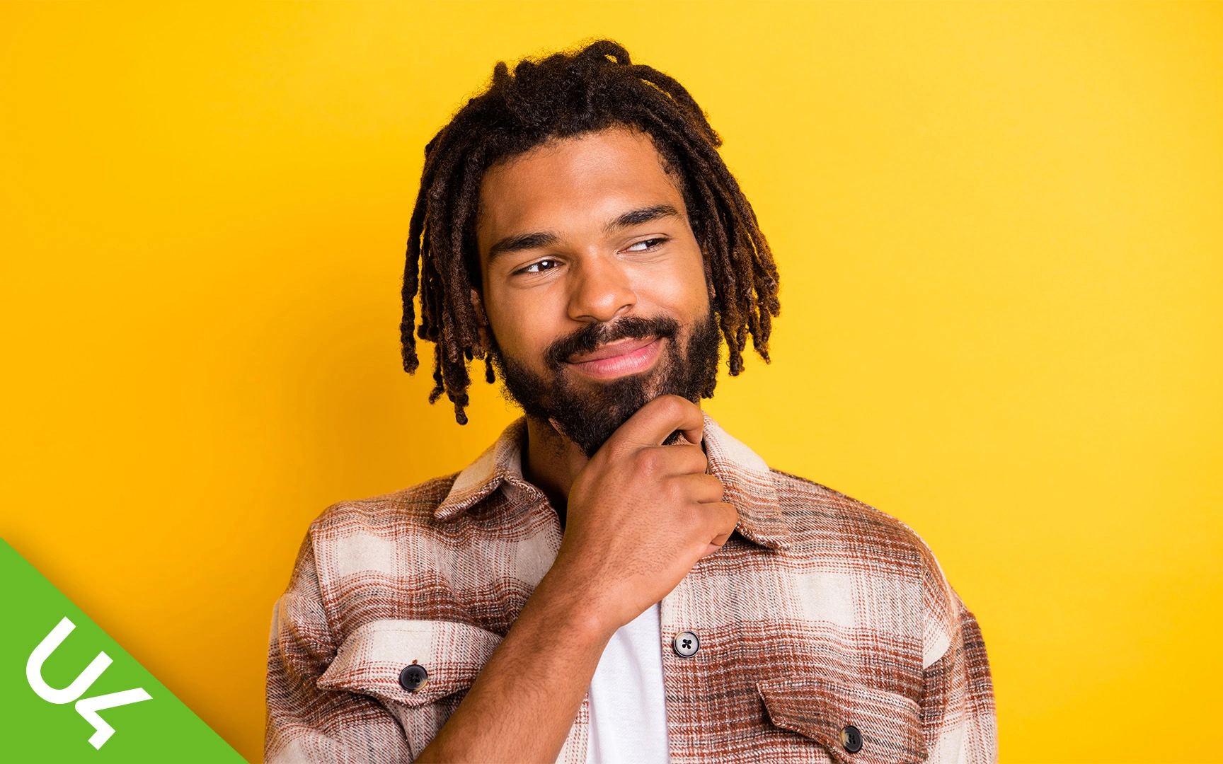 Smiling man on yellow background
