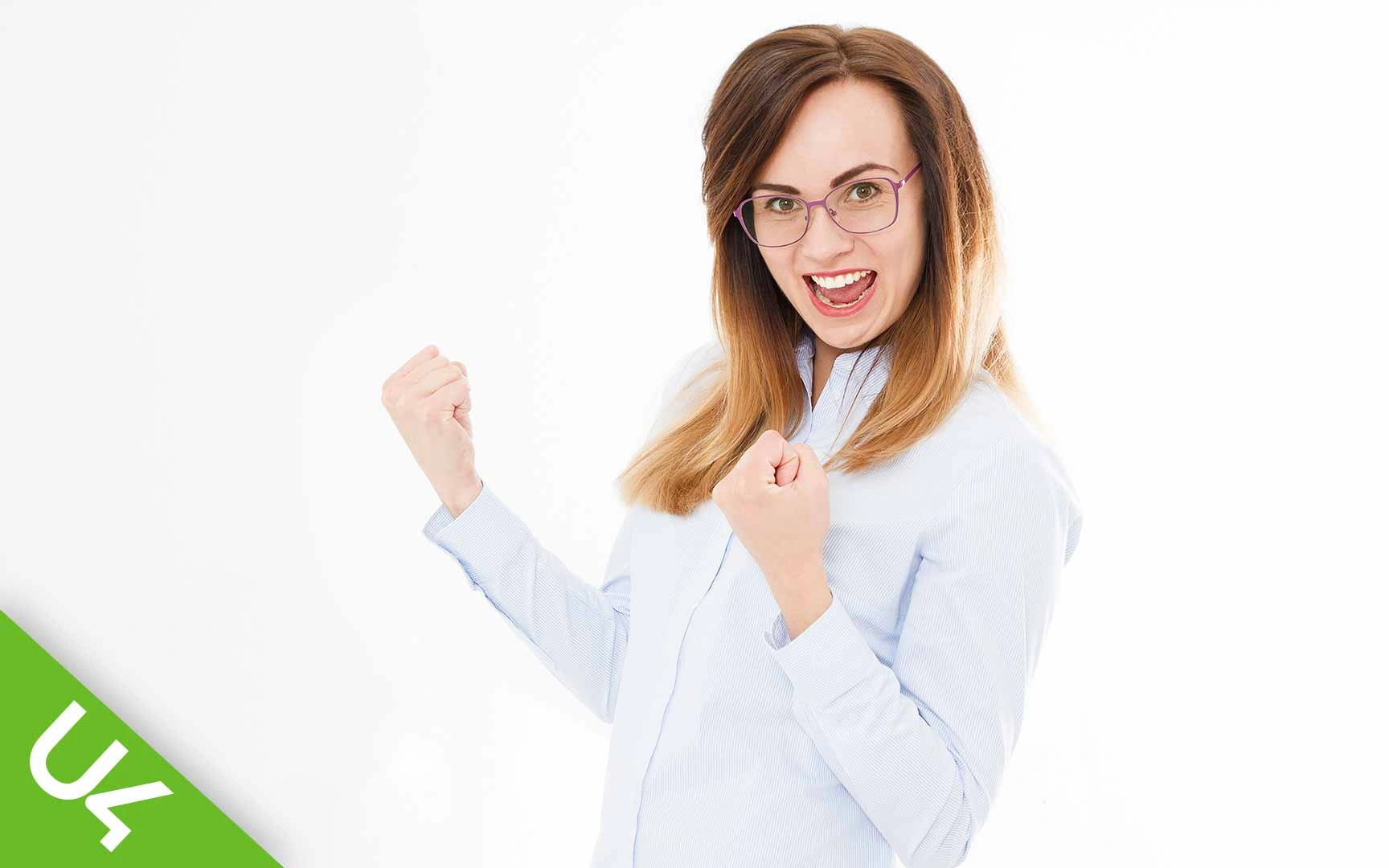 Smiling woman with both arms half raised and fists clenched in celebration