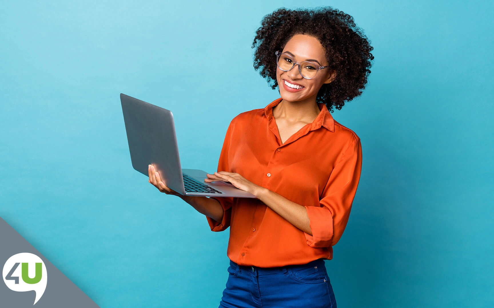 Smiling woman with laptop